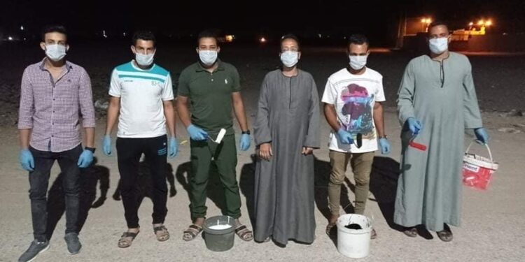 شباب الكرنك وتجميل القرية بعلم مصر