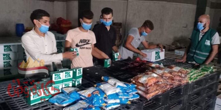 بالصور … شباب مصر يشاركون في تجهيز مواد الإغاثة المقدمة للشعب اللبناني