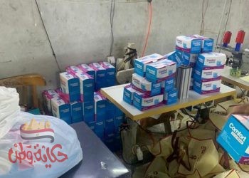 ضبط مصنع لانتاج الكمامات بدون ترخيص بحي الضواحي والتحفظ علي ٣٠ الف كمامة